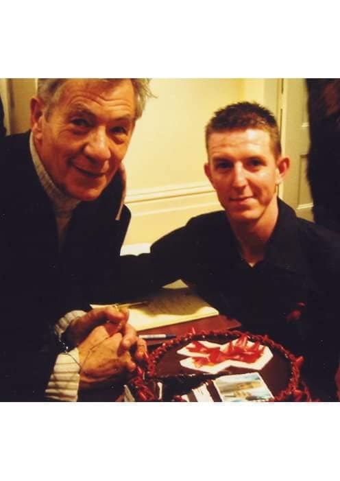 James Alexander Laverty with Sir Ian McKellen, World Aids Day, Wellington Gay Business Group, 2004, Mr Gay Wellington 2005, Business Leader, The Chocolate Cake Company, Government House, For the Global Operations Photo: "Managing complex business and logistics frameworks across the New Zealand and Australian corridors (Auckland, Wellington, and Darwin)."